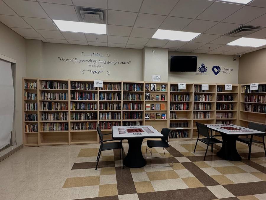 Camillus House library with full bookshelves